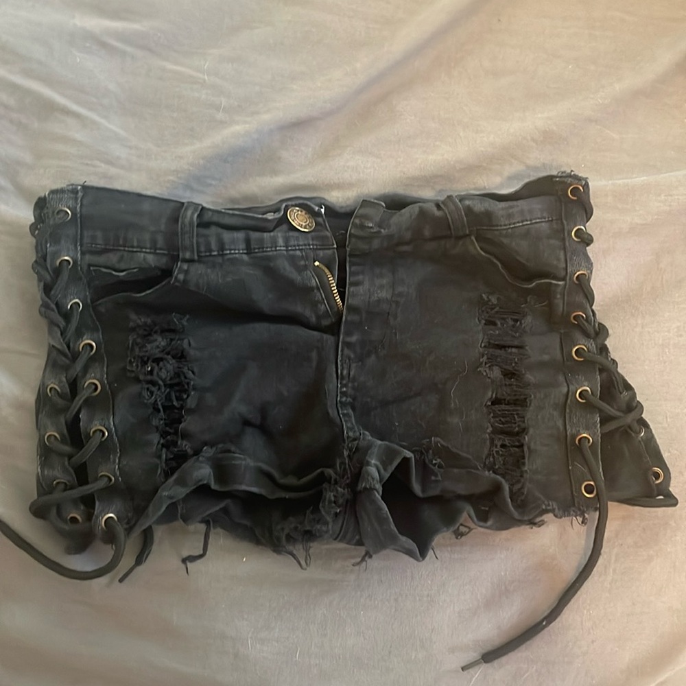 Black pair of Be Wicked shorts with lace up sides